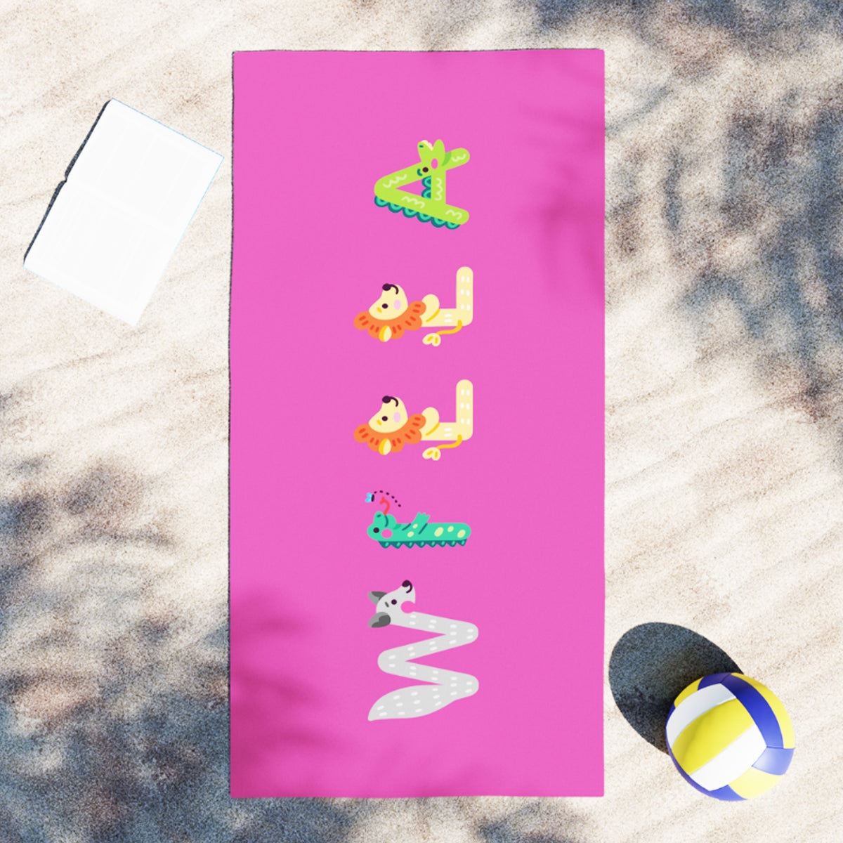 Pink towel with name willa spelled out in animal letters