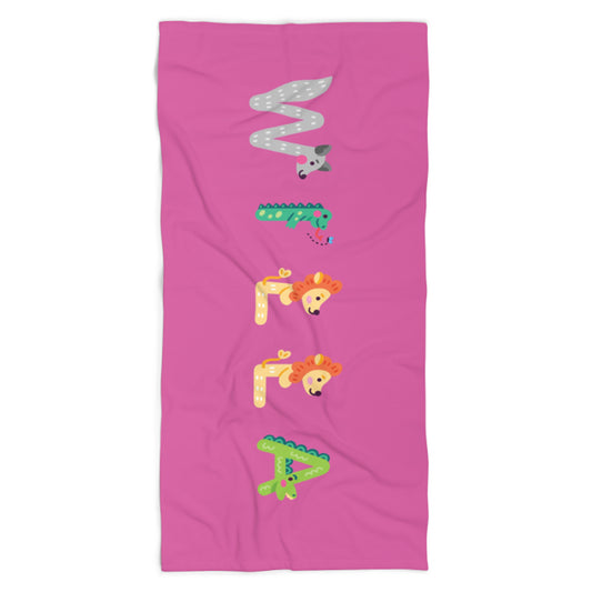 Pink towel with name willa spelled out in animal letters