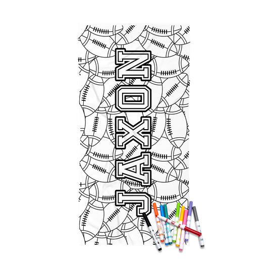 A black and white personalized sports-themed coloring page featuring the name 'NOXAJ' in large varsity-style letters over a background of baseballs and footballs, with a small cluster of colored markers at the bottom right on a white background.