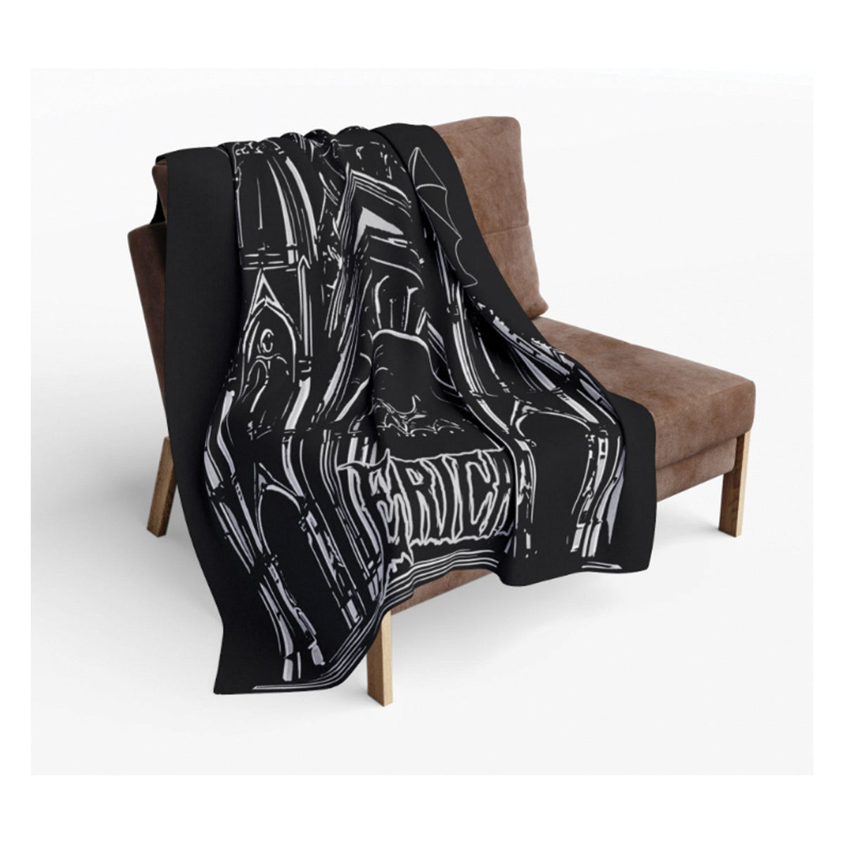 A black throw blanket with a white gothic architectural line pattern draped over a brown armchair against a light gray background.