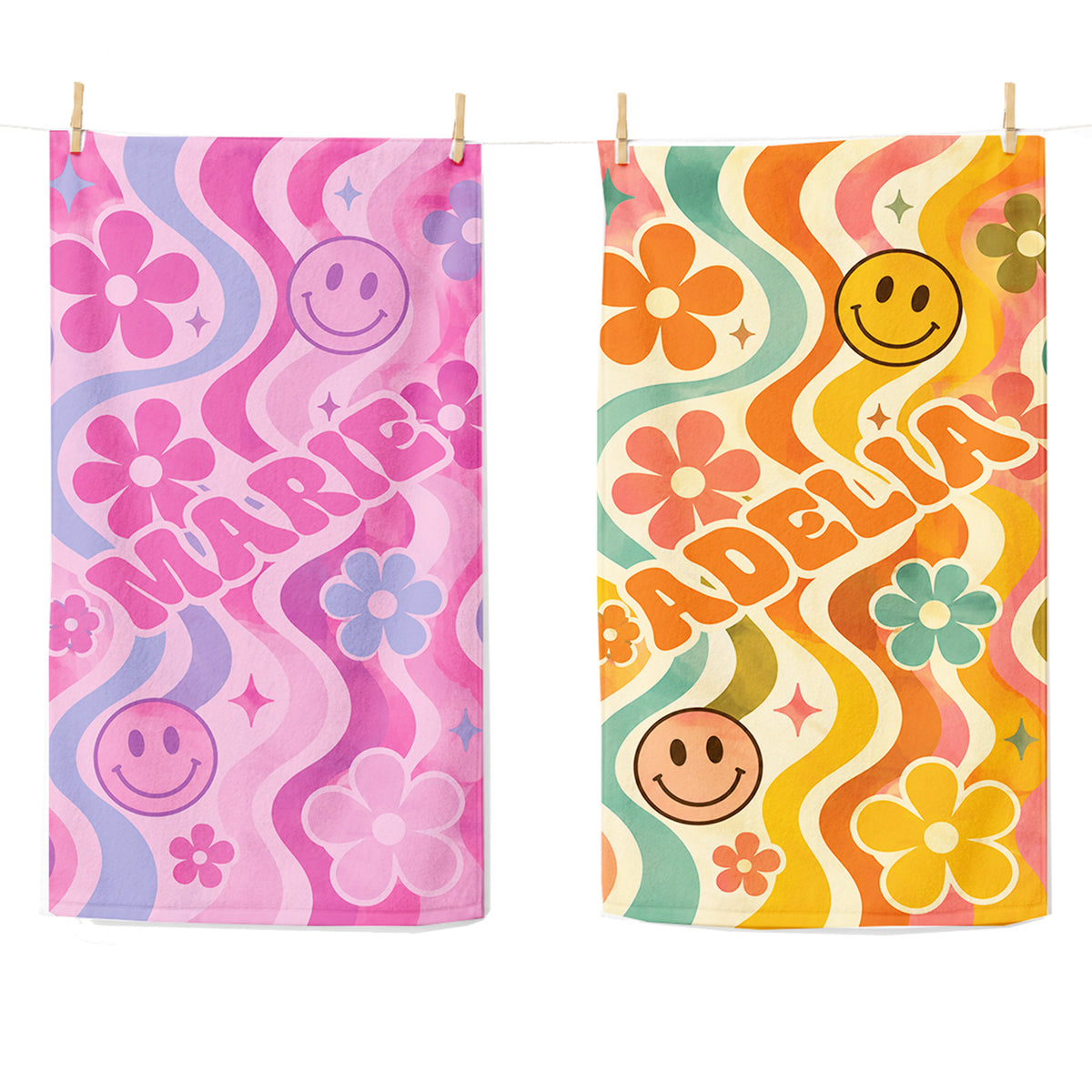 Colorful PInk beach towel with pink smily faces, pink and blue flowers on light pink background