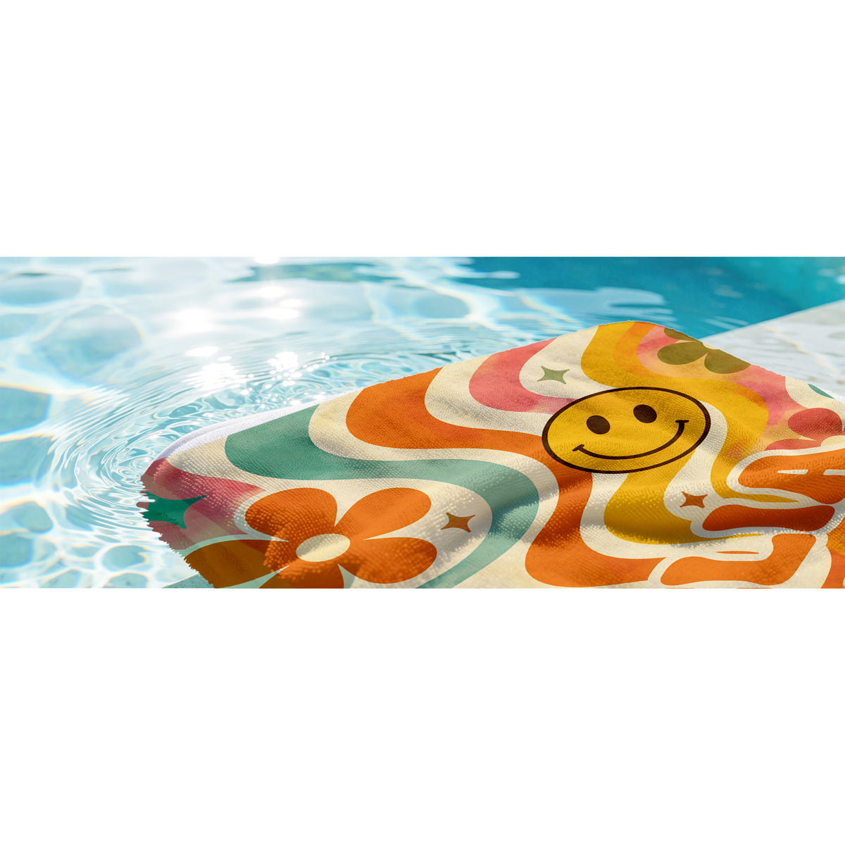 Colorful PInk beach towel with pink smily faces, pink and blue flowers on light pink background