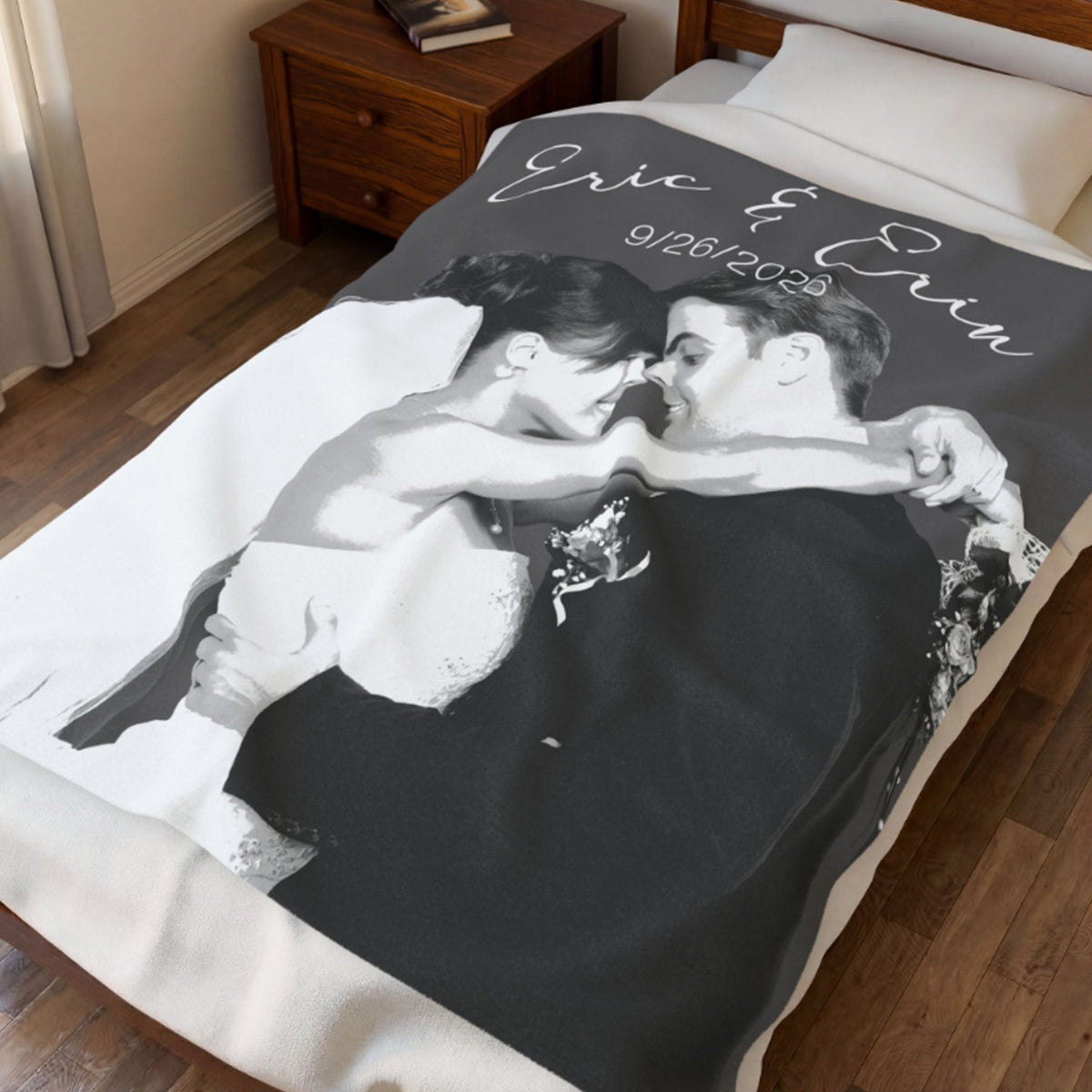 A personalized photo blanket featuring a black and white wedding couple portrait with the names 'Eric & Erin' and date '9.26.