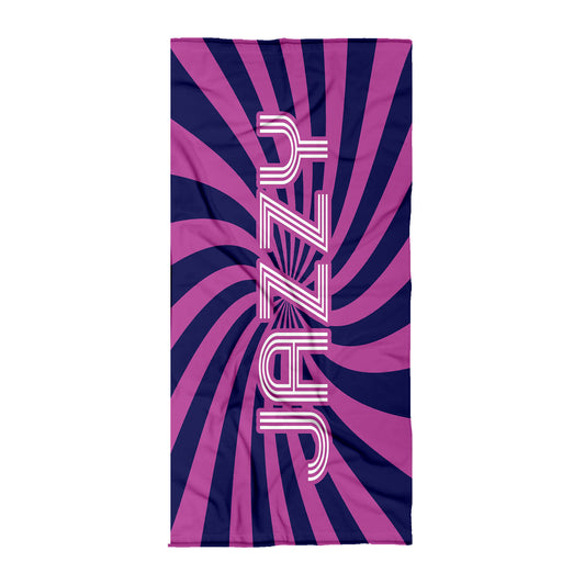 Purple towel with dark purple swirls with name Jazzy on it.