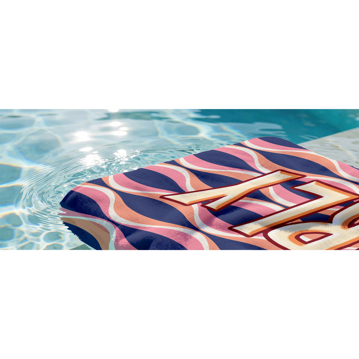 A rectangular beach towel featuring a retro wavy pattern in navy blue, pink, and peach, with the name 'MARLY' printed vertically in large beige block letters with a red outline.
