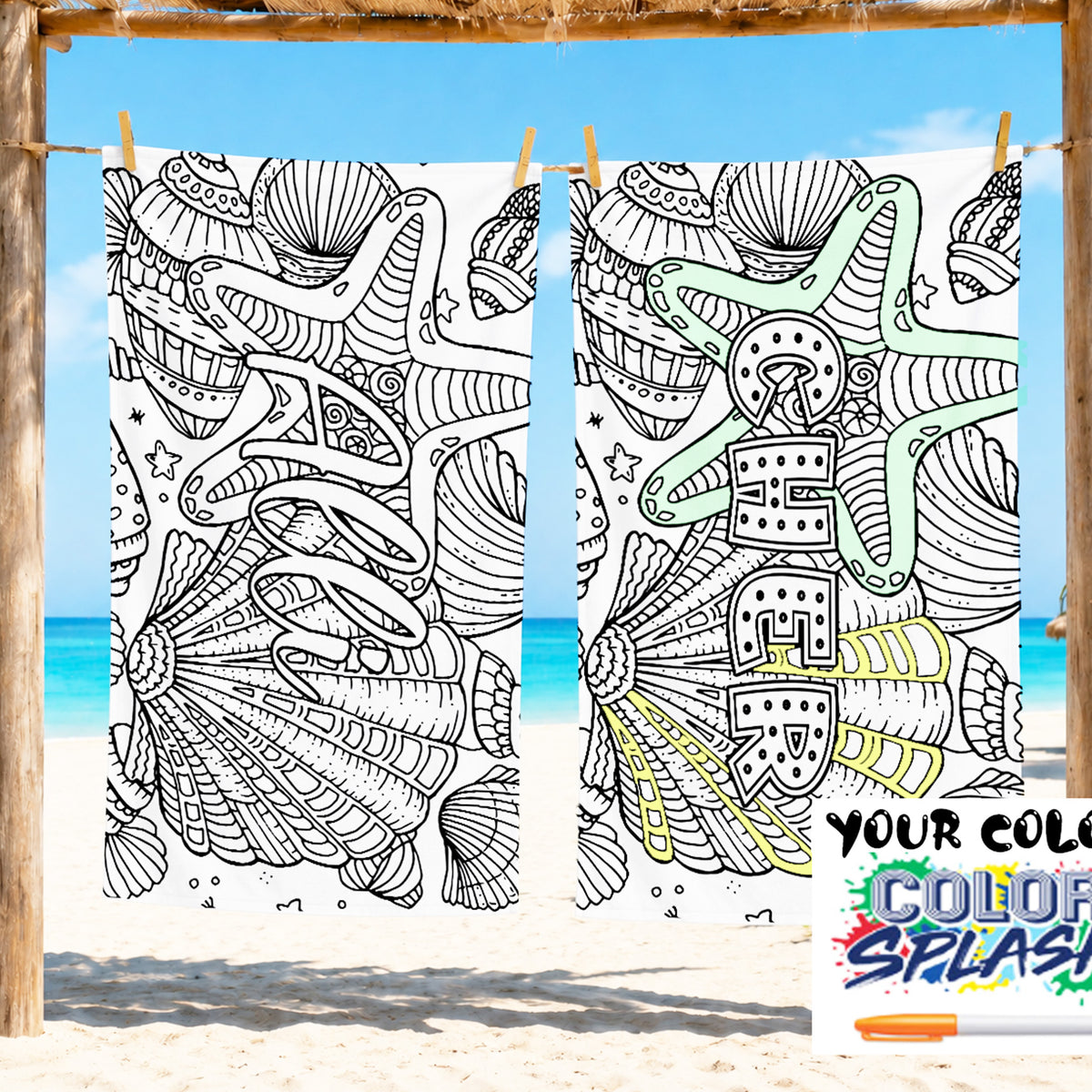 Two white beach towels with black-and-white starfish and shell line-art designs hanging on a wooden frame at the beach, with ocean and sand in the background. A colorful 'YOUR COLOR COLOR SPLASH' label appears in the lower right corner.