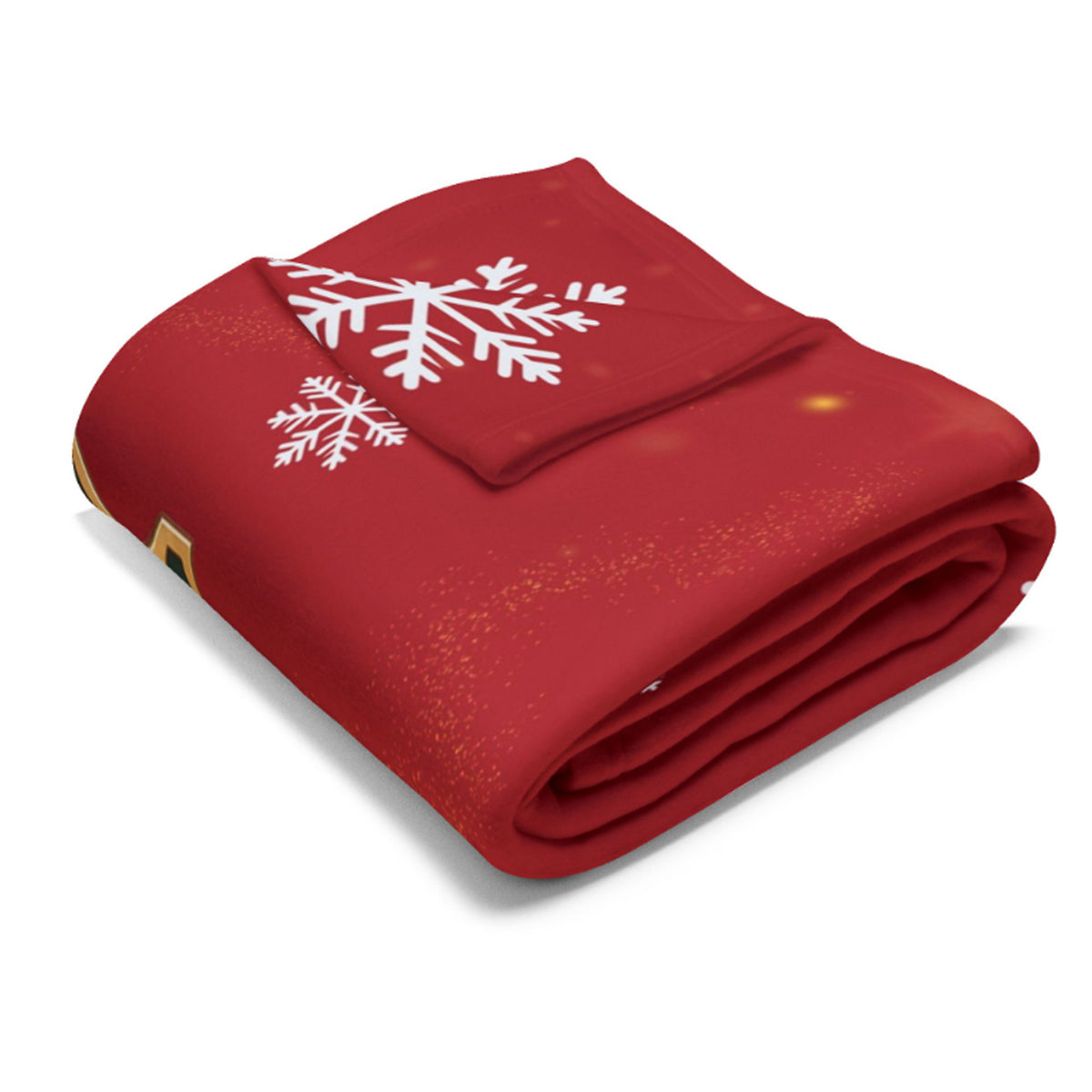 A folded red blanket with white snowflake designs and subtle gold glitter details, shown on a clean white background.